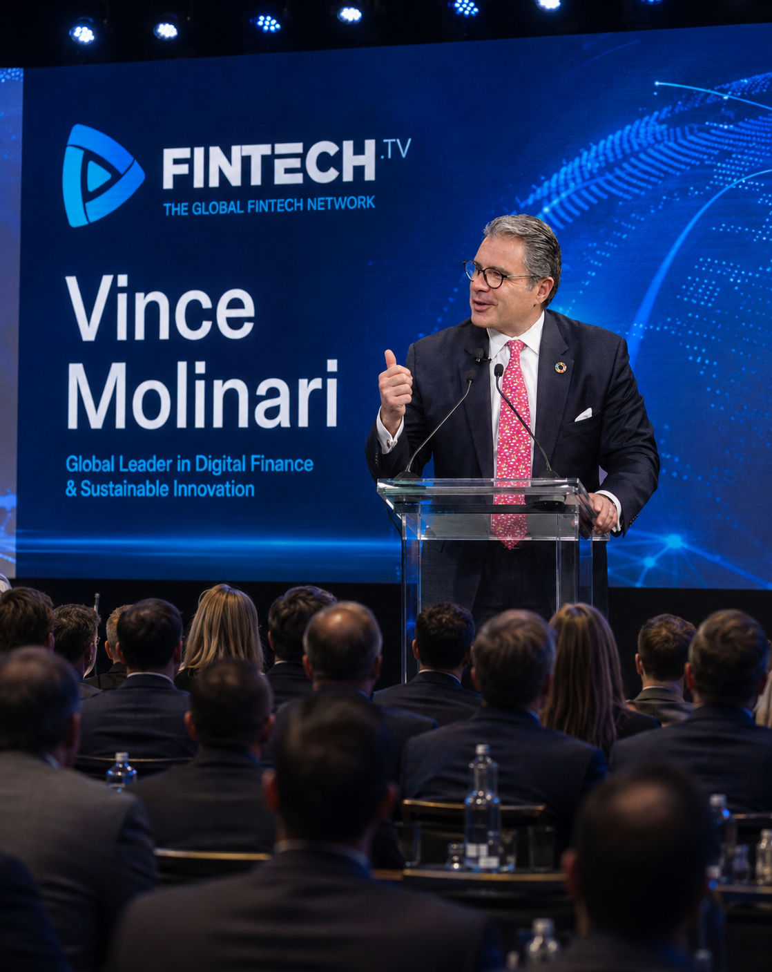 Vince Molinari speaking on stage at a global finance and fintech conference